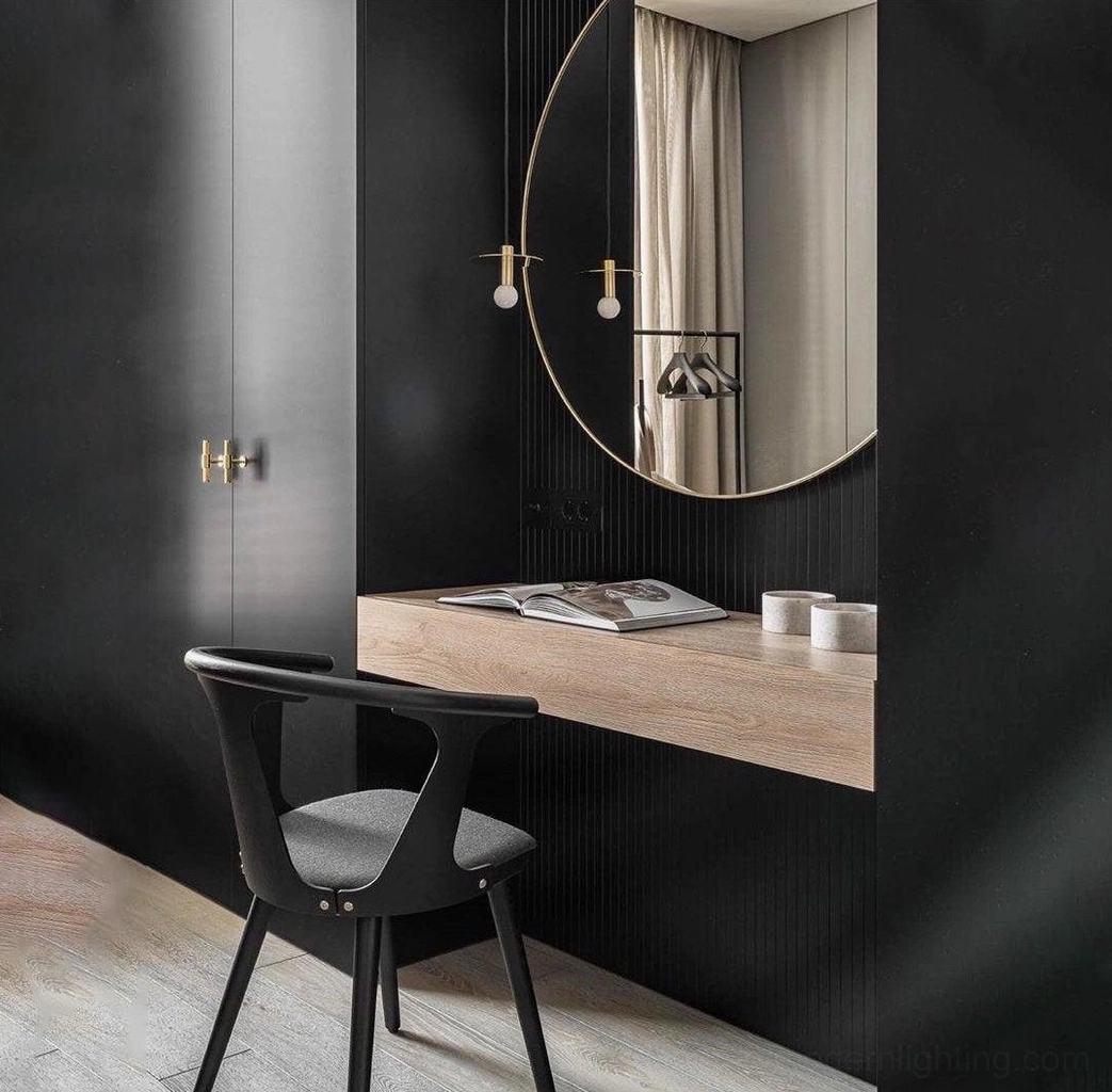 Avida black pendant light in contemporary vanity workspace with dark accent walls and floating desk design