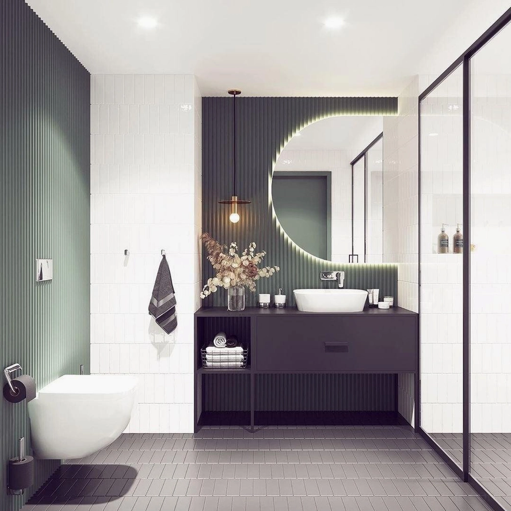 Avida pendant lamp illuminating modern luxury bathroom with backlit round mirror and minimalist design aesthetic