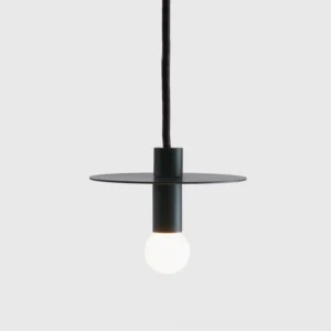 Side angle view of Avida pendant ceiling light showing flat metal disc shade and cylindrical mounting fixture