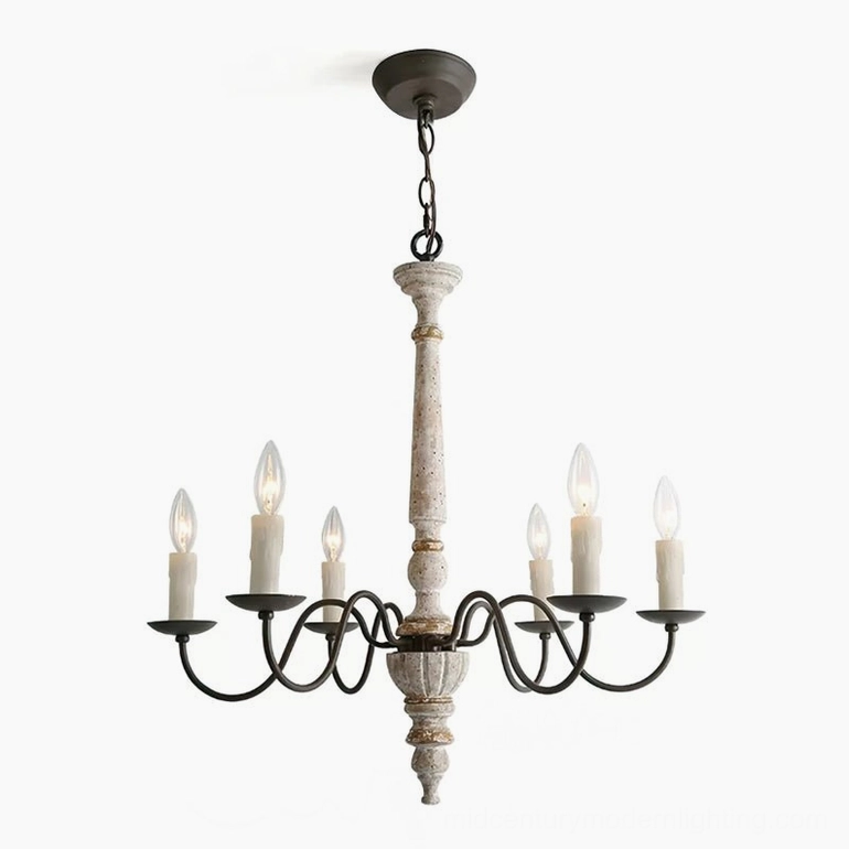 Avignon 6-head farmhouse chandelier with distressed whitewashed wood post and black curved metal arms, studio flat perspective