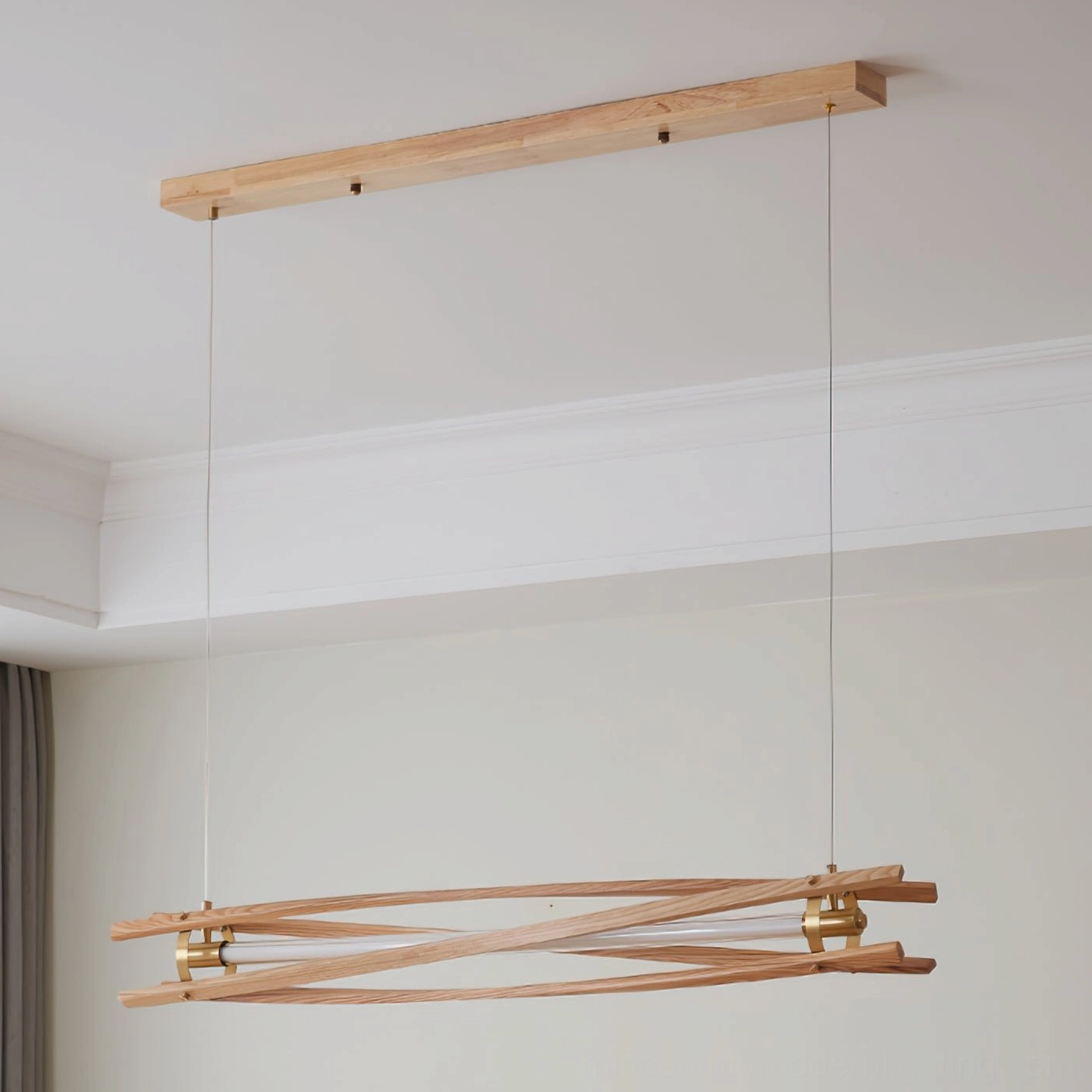 Axis wooden pendant light framework detail showing intersecting linear wood elements and brass connection points