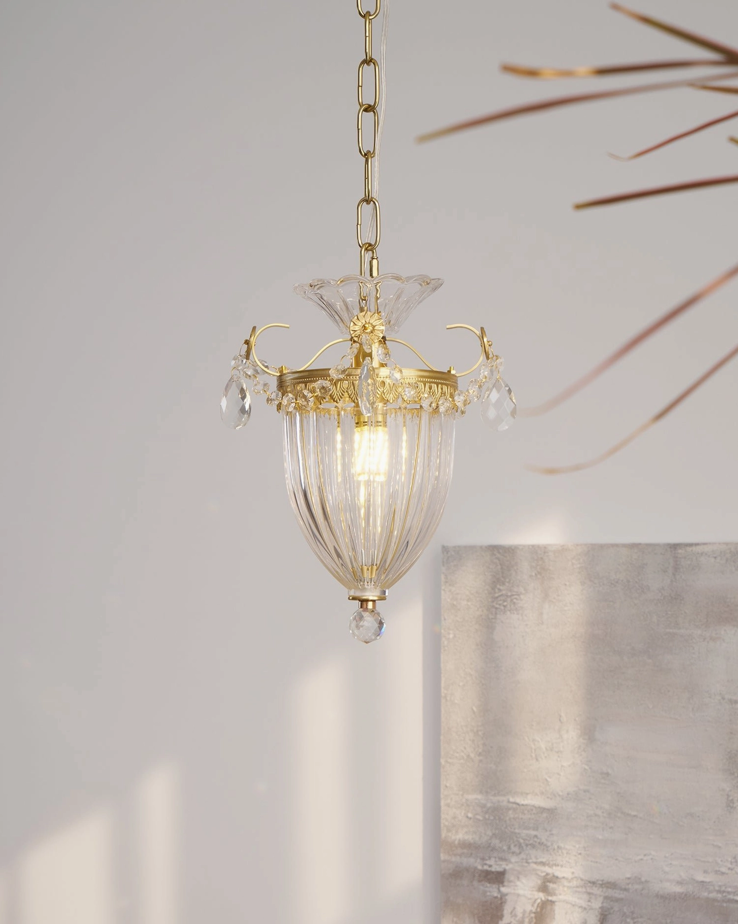 Bagatelle crystal pendant lamp sunlit hanging view with warm glow