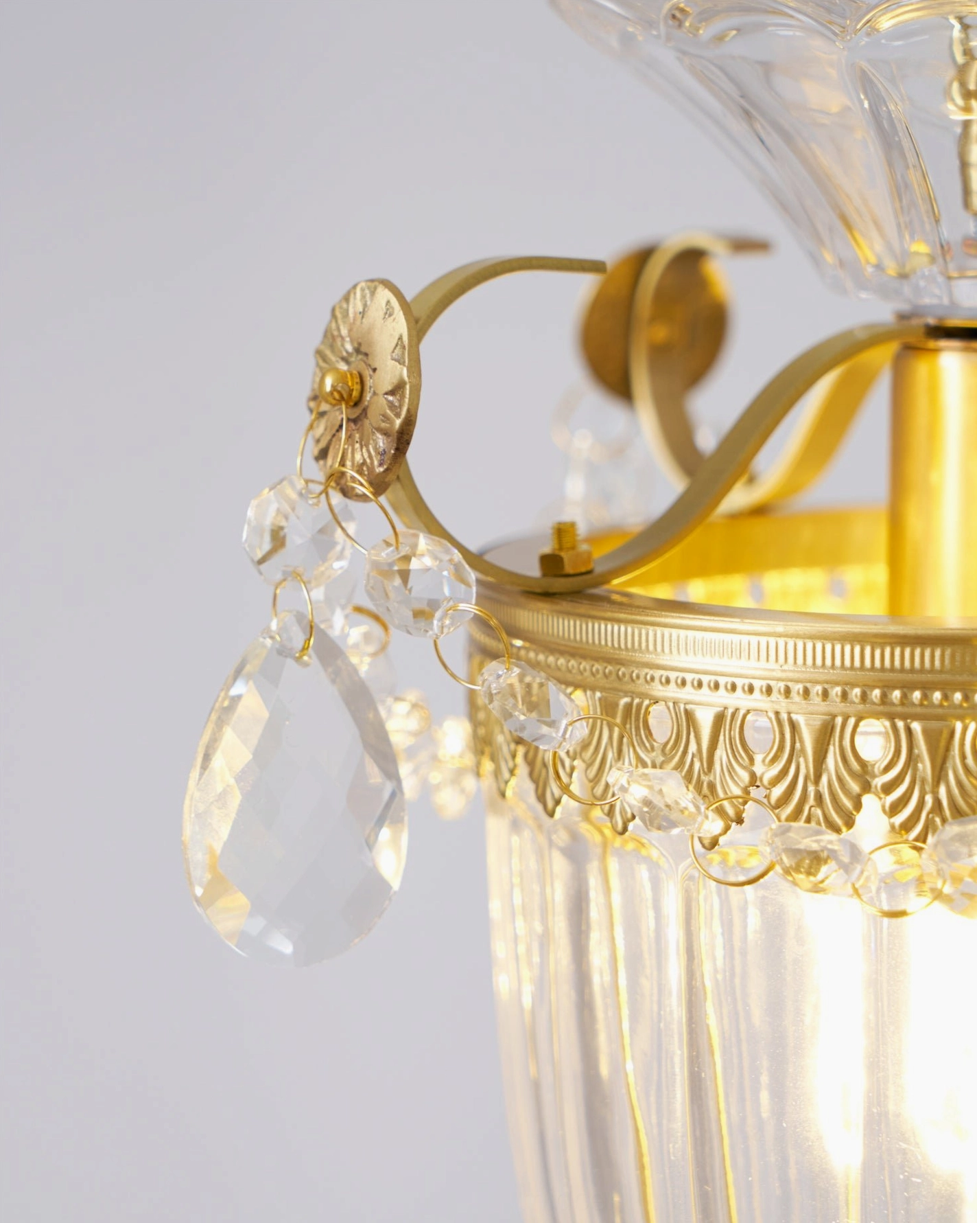 Bagatelle pendant lamp ornate brass hardware and faceted crystal close-up detail