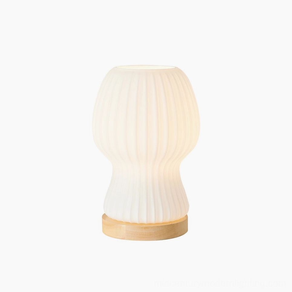 Baja pleated glass table lamp with white and wood color finish options
