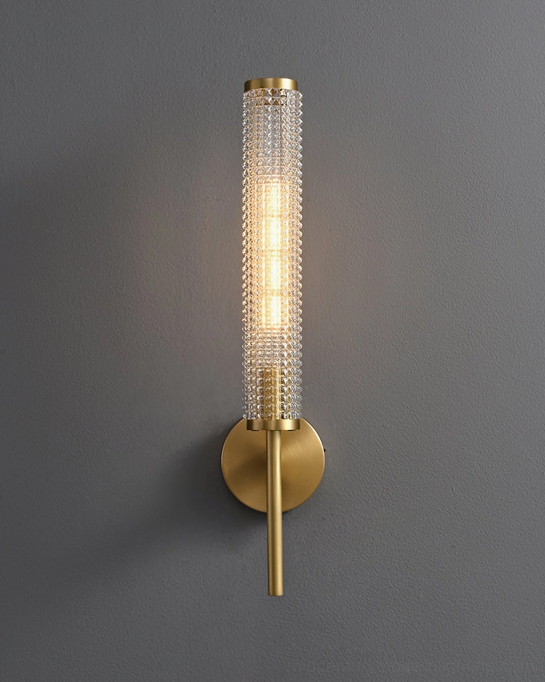 Baldassare mid-century modern brass wall lamp studio product shot