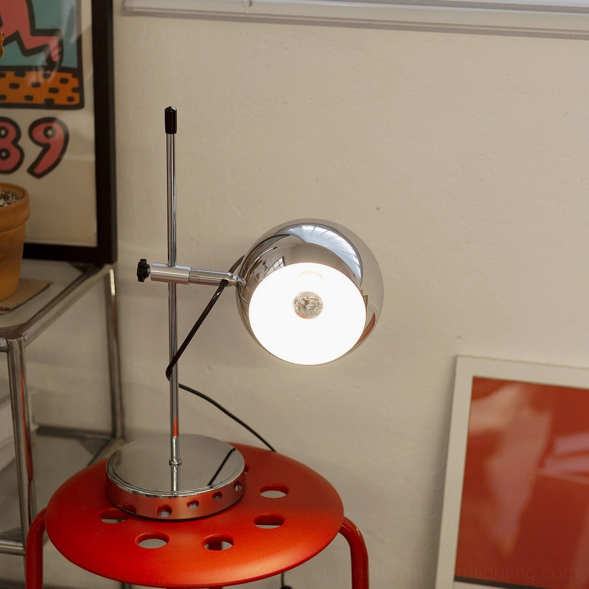 Ball bracket table lamp lifestyle image showing functional task lighting setup