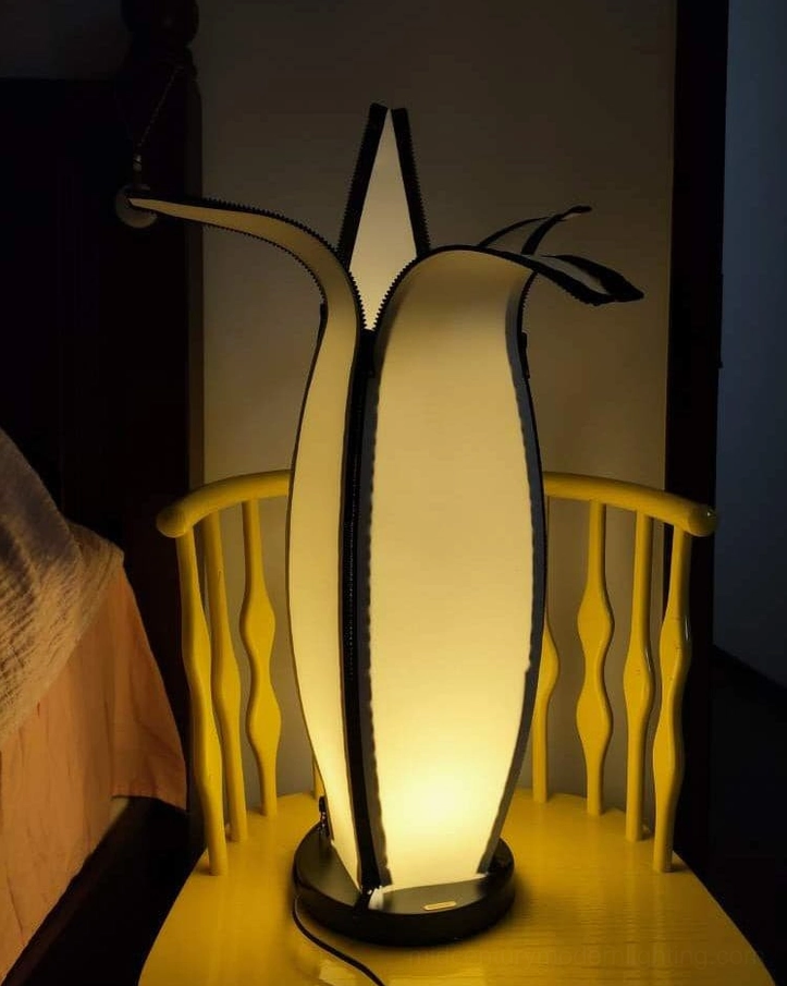 Banana table lamp with warm LED or Edison bulb option for flexible lighting aesthetics