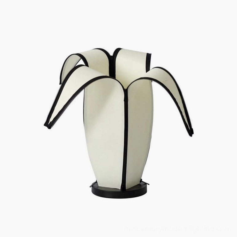 Textile fabric shade on banana table lamp with detailed black edge trim craftsmanship