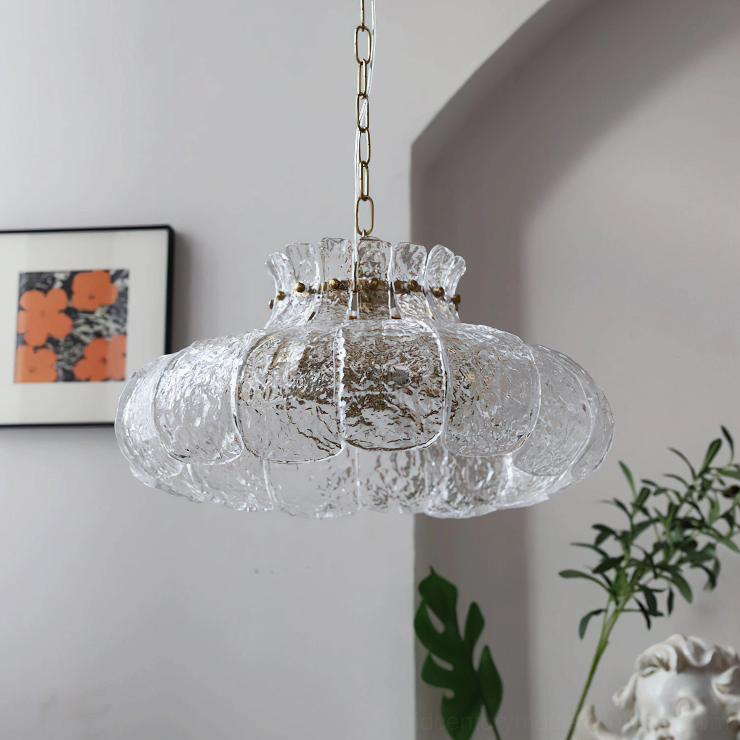 Barlas scalloped glass chandelier showing light refraction through ribbed surface and hanging chain system