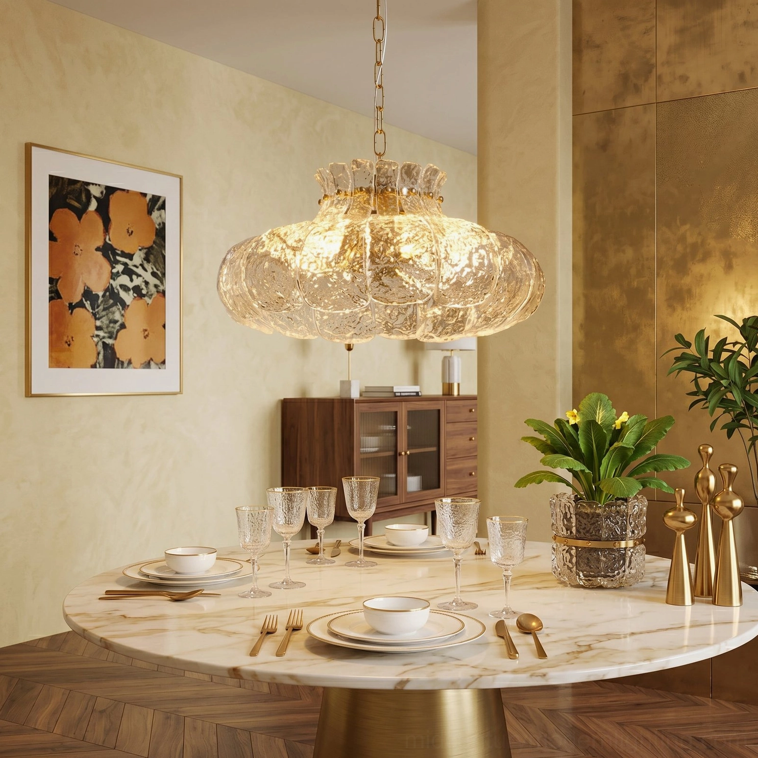 Barlas pendant light in luxury modern dining area with marble round table and gold metal accents, low front view