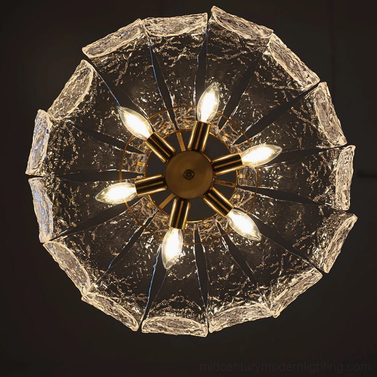 Barlas pendant light close-up of scalloped glass pumpkin form and industrial metal mounting hardware
