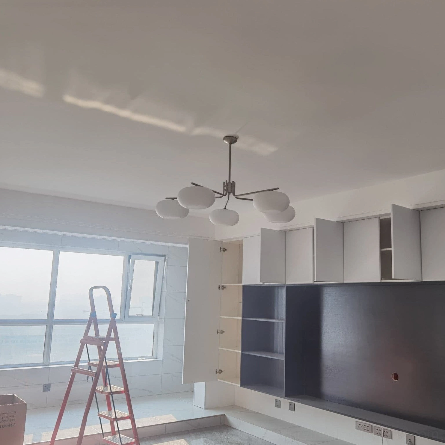 Barndon frosted glass chandelier pendant light installation showing suspension rod and adjustable ceiling mount