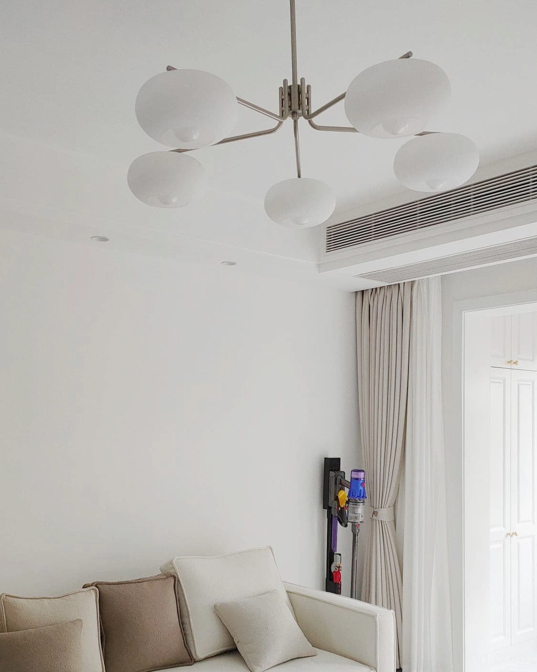 Barndon industrial chandelier white finish showing geometric metal framework and minimalist aesthetic