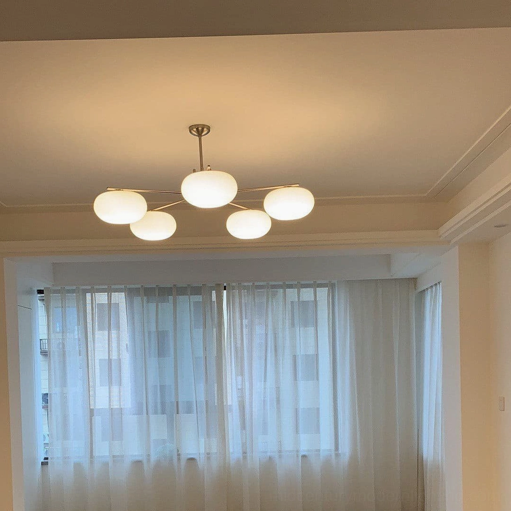 Barndon mid-century modern chandelier in scandinavian minimalist home interior design setting