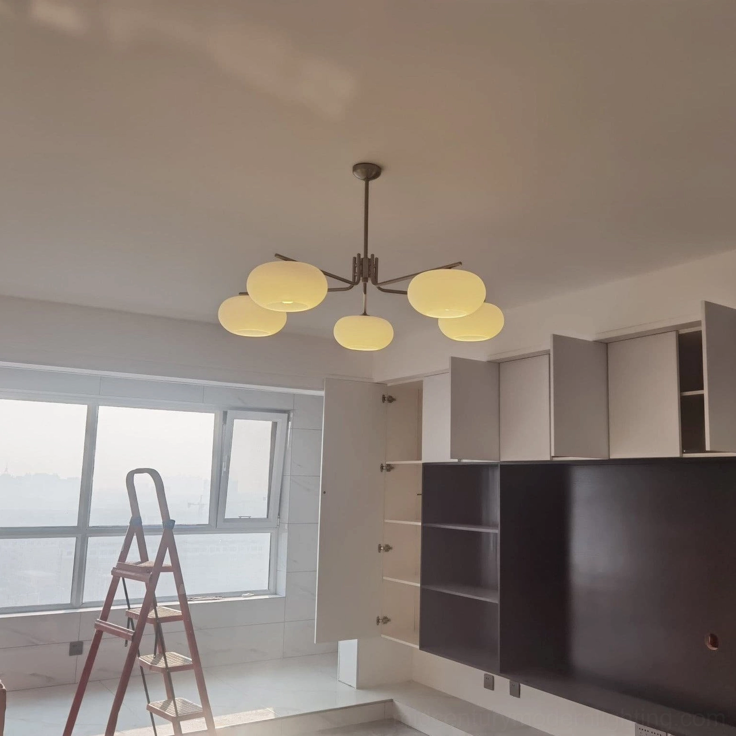 Barndon mid-century modern glass chandelier showing soft diffused lighting and refined minimalist design