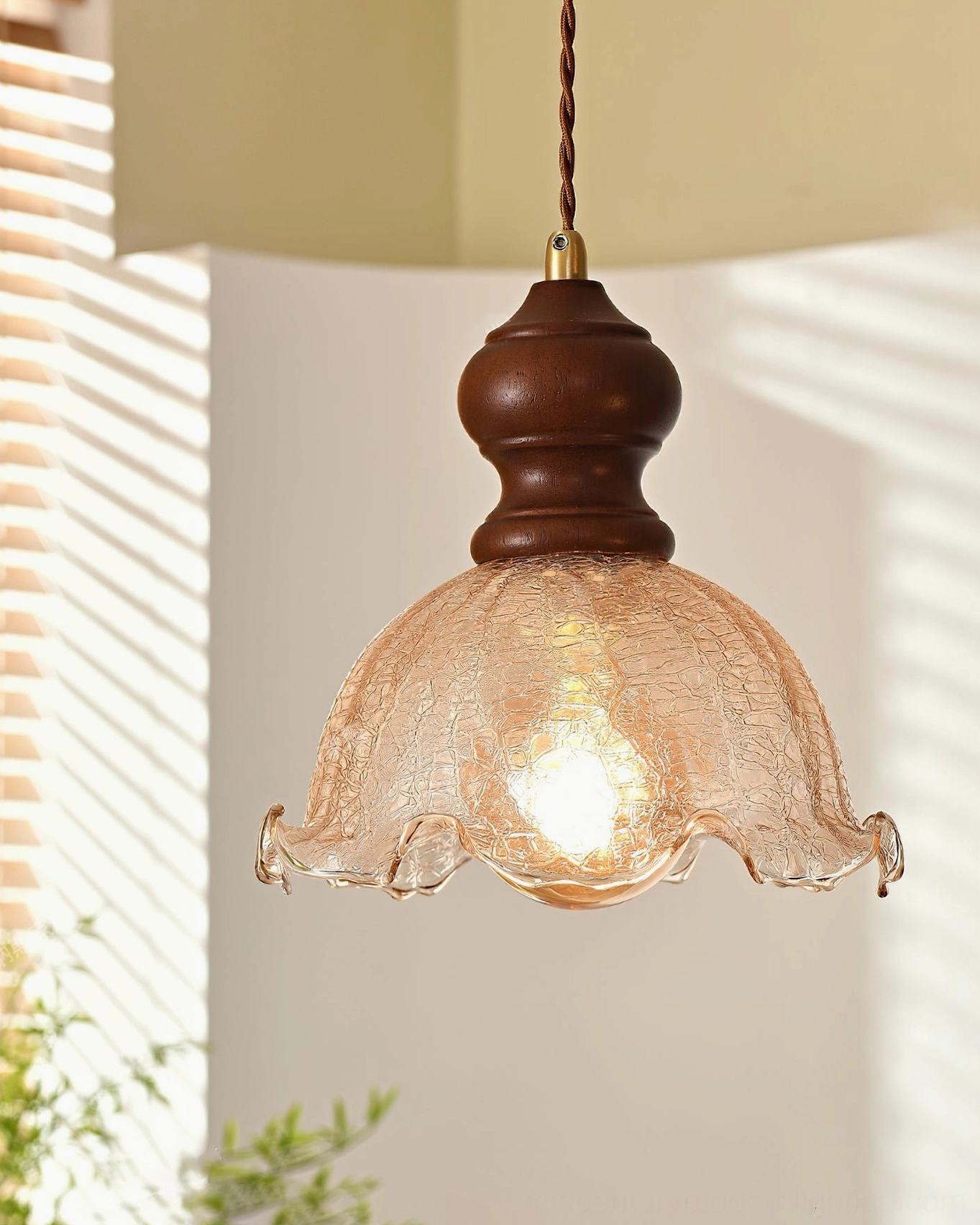 Barron vintage pendant light with Edison bulb visible through textured amber glass shade
