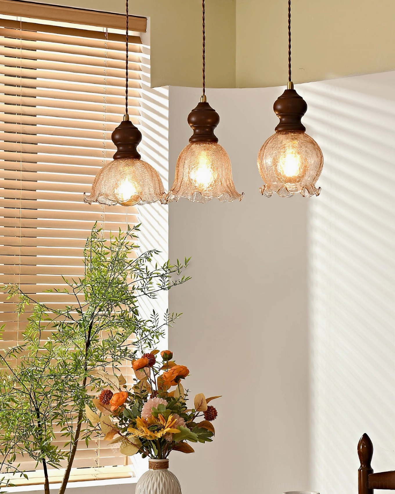 Three Barron vintage pendants with exposed warm bulbs showing textured ruffled glass shades