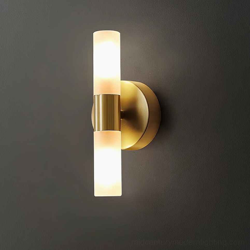 Barton wall sconce product hero shot, dual frosted-glass cylinders with brass cinching band