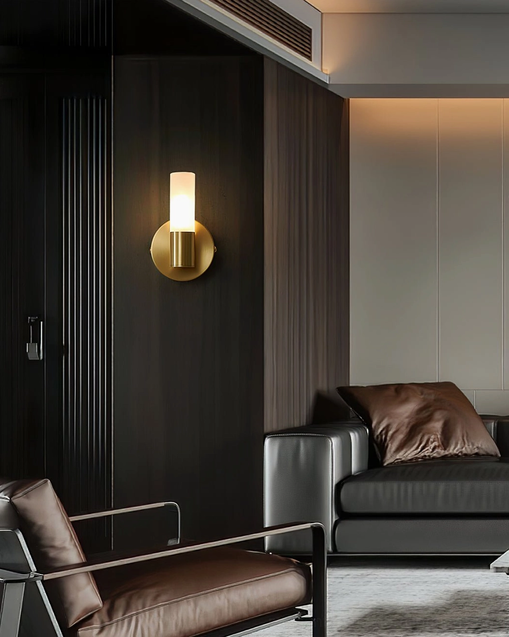 Barton wall sconce installed in luxury leather living room, ambient lighting accent