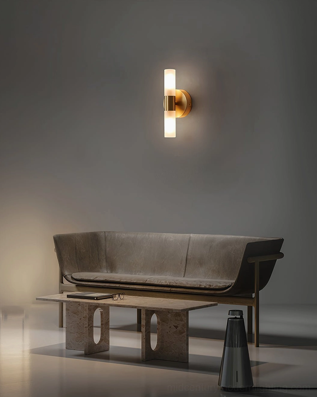 Barton dual-cylinder sconce, wide view in modern minimalist lounge with brass finish