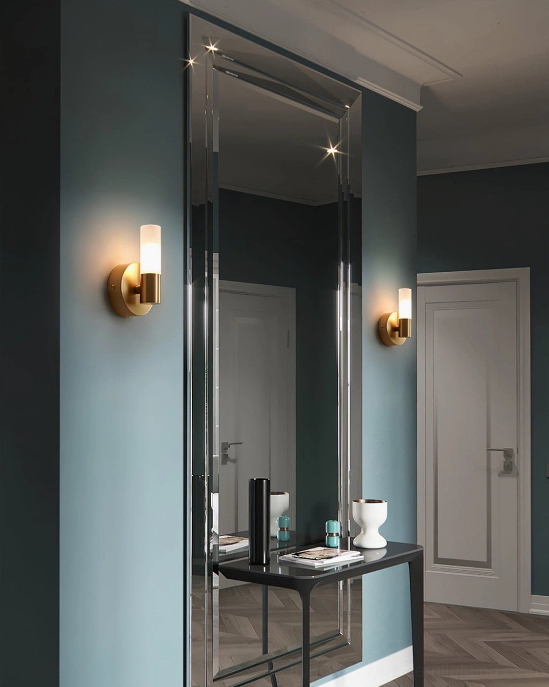 Symmetrical pair of Barton wall sconces flanking console table in elegant modern foyer