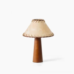 Basica mid-century modern table lamp with solid wood base and hand-stitched fabric shade, front view on white background