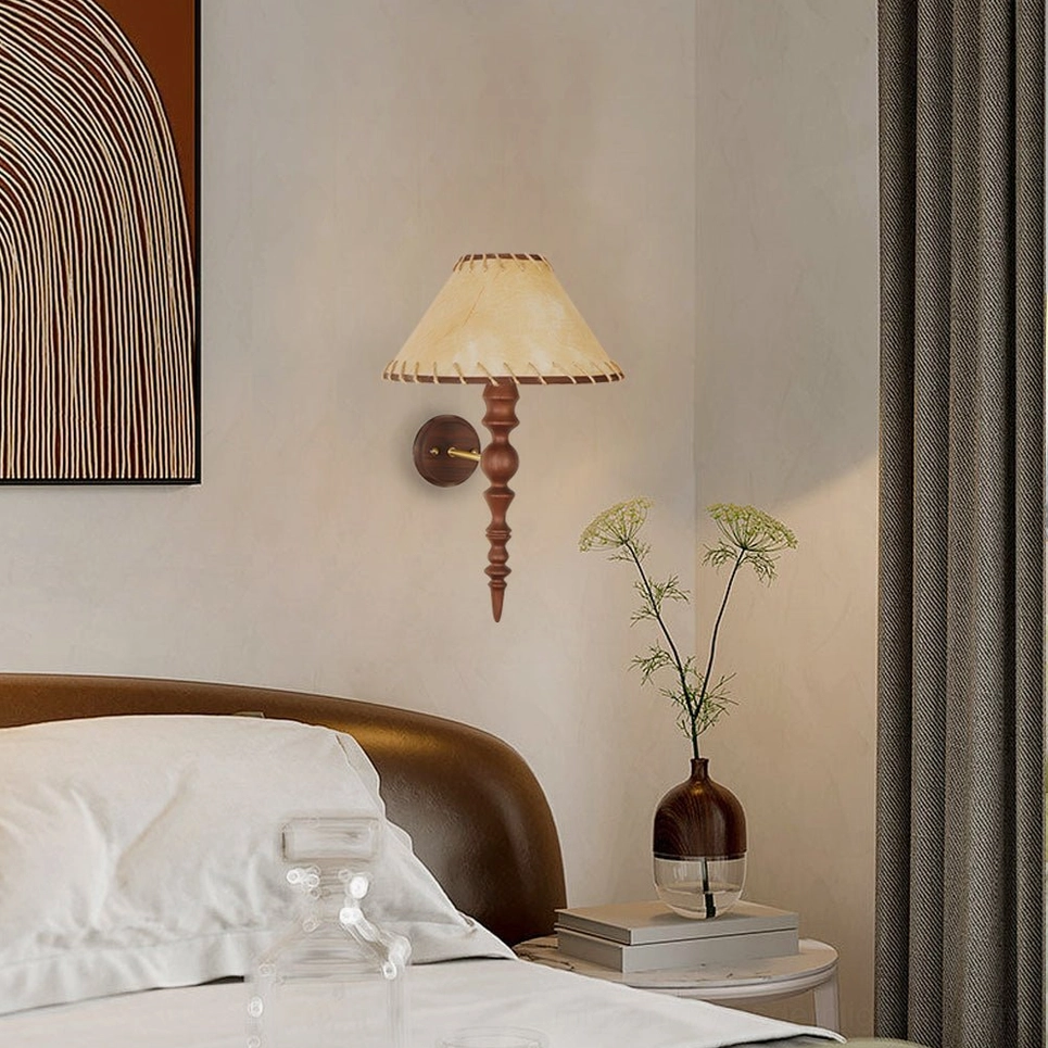 Basica wall lamp mounted in modern master bedroom with abstract wall art and potted plant
