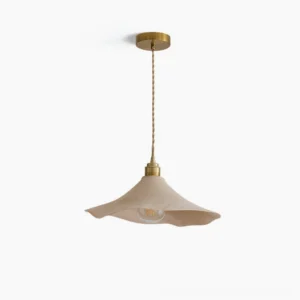Baxter organic wave pendant light with wavy light beige shade and brass metal fixtures shown from overhead front view in studio lighting