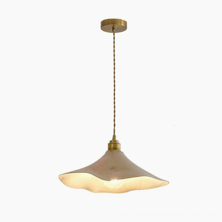Baxter pendant light small size variant with warm wood and gold finish in intimate dining space setting