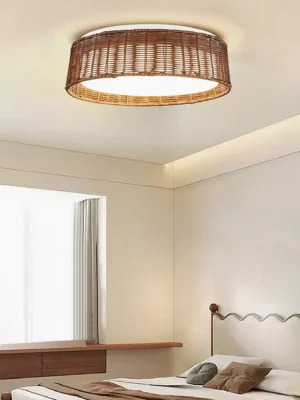 Bayou rattan ceiling light installed in modern bedroom interior, providing warm ambient lighting above bedside area with neutral décor
