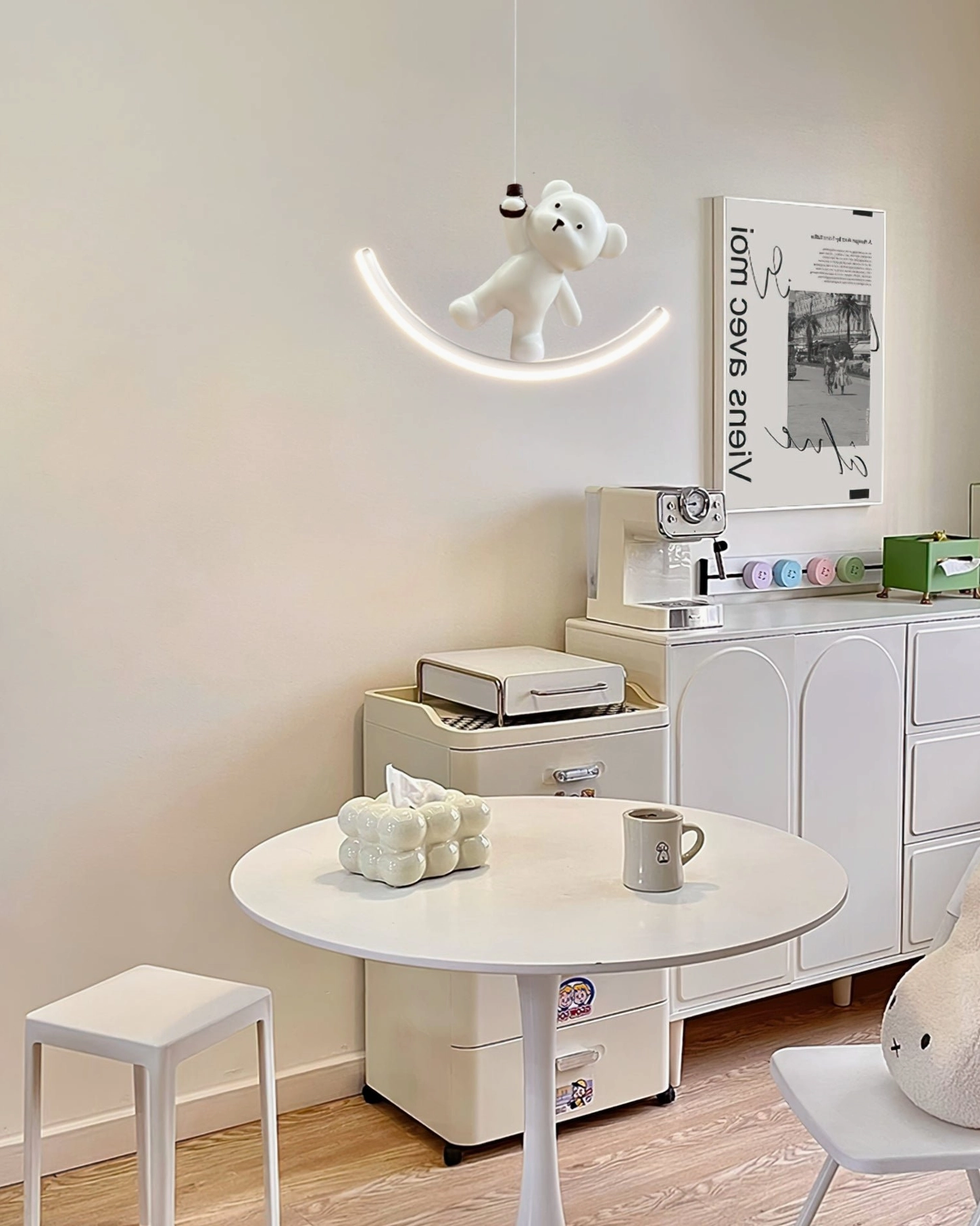 Bear pendant light in modern dining room interior - ambient lighting above white dining table