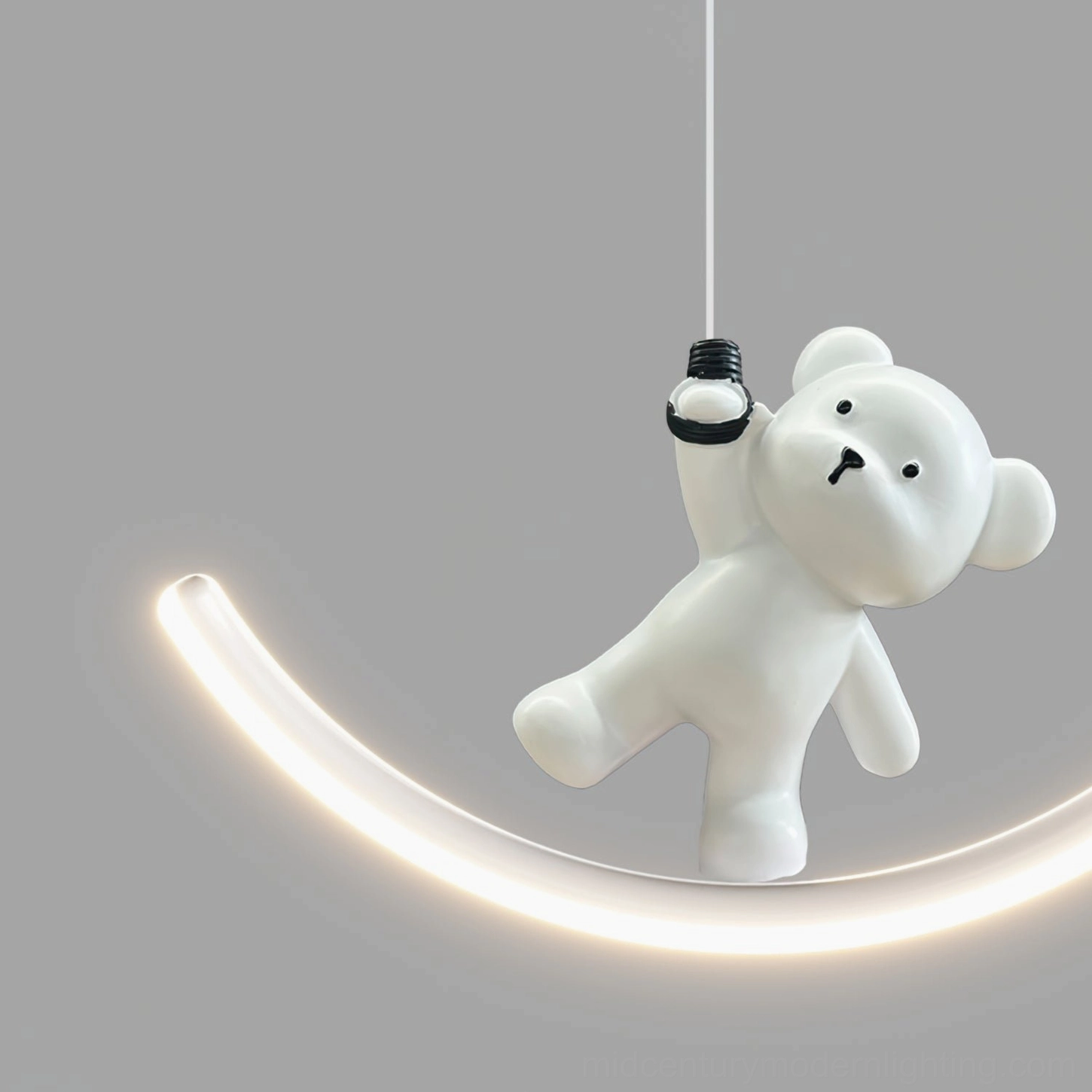 Lit bear resin pendant light showing warm white LED illumination and acrylic diffuser glow