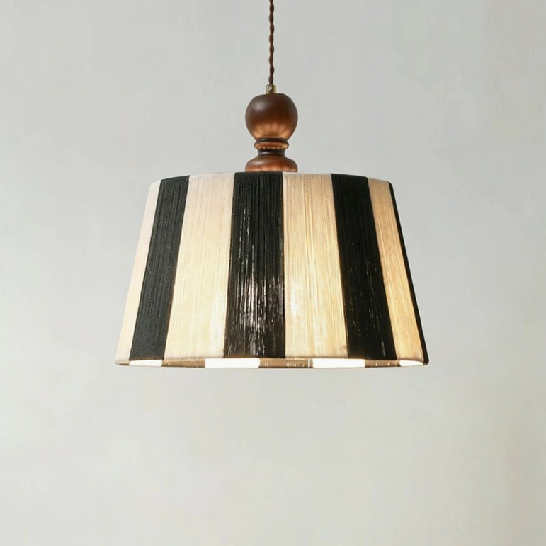 Beatrice pendant fixture with high-contrast black and white vertical stripe shade and twisted fabric cord on white background