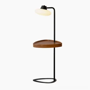 Beatrix mid-century modern floor lamp with integrated wooden tray, minimalist black metal frame and frosted glass shade, front studio view