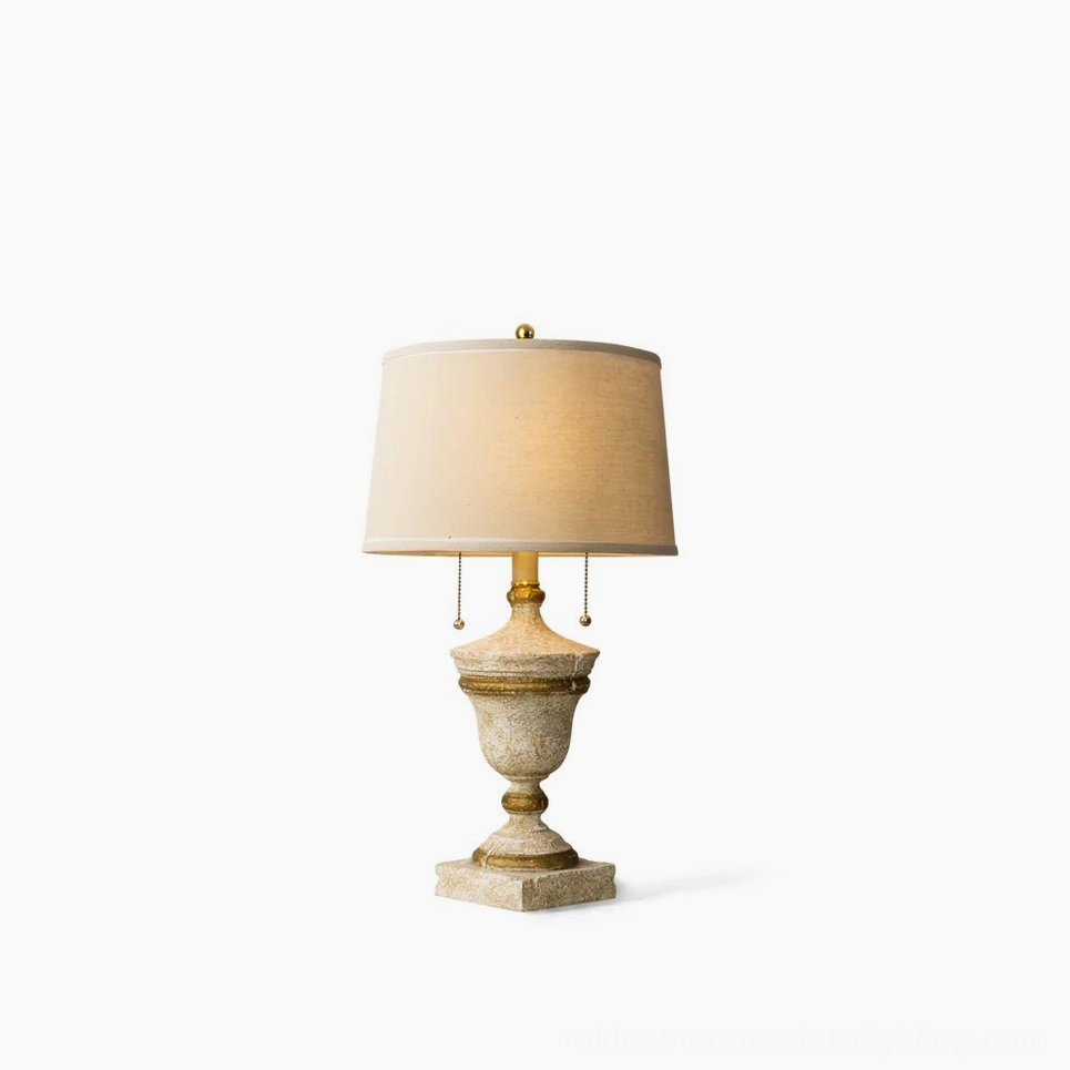 Beatrix antique white vintage table lamp with ornate urn-shaped base and gold accents - frontal studio view