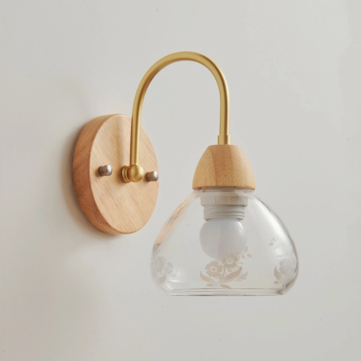 Armed wall lamp installed in contemporary bedroom showing bedside lighting application