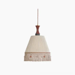 Beige fringe tassel pendant lamp with woven cotton shade and decorative bead trim on white background