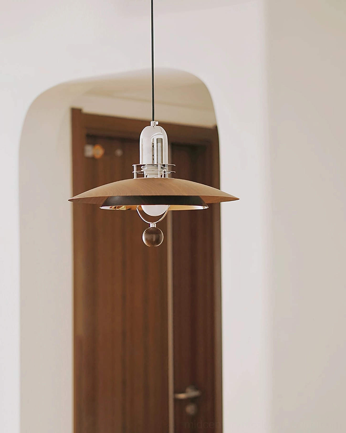 Belid retro pendant lamp side view archway entryway, light natural wood finish clear glass sphere