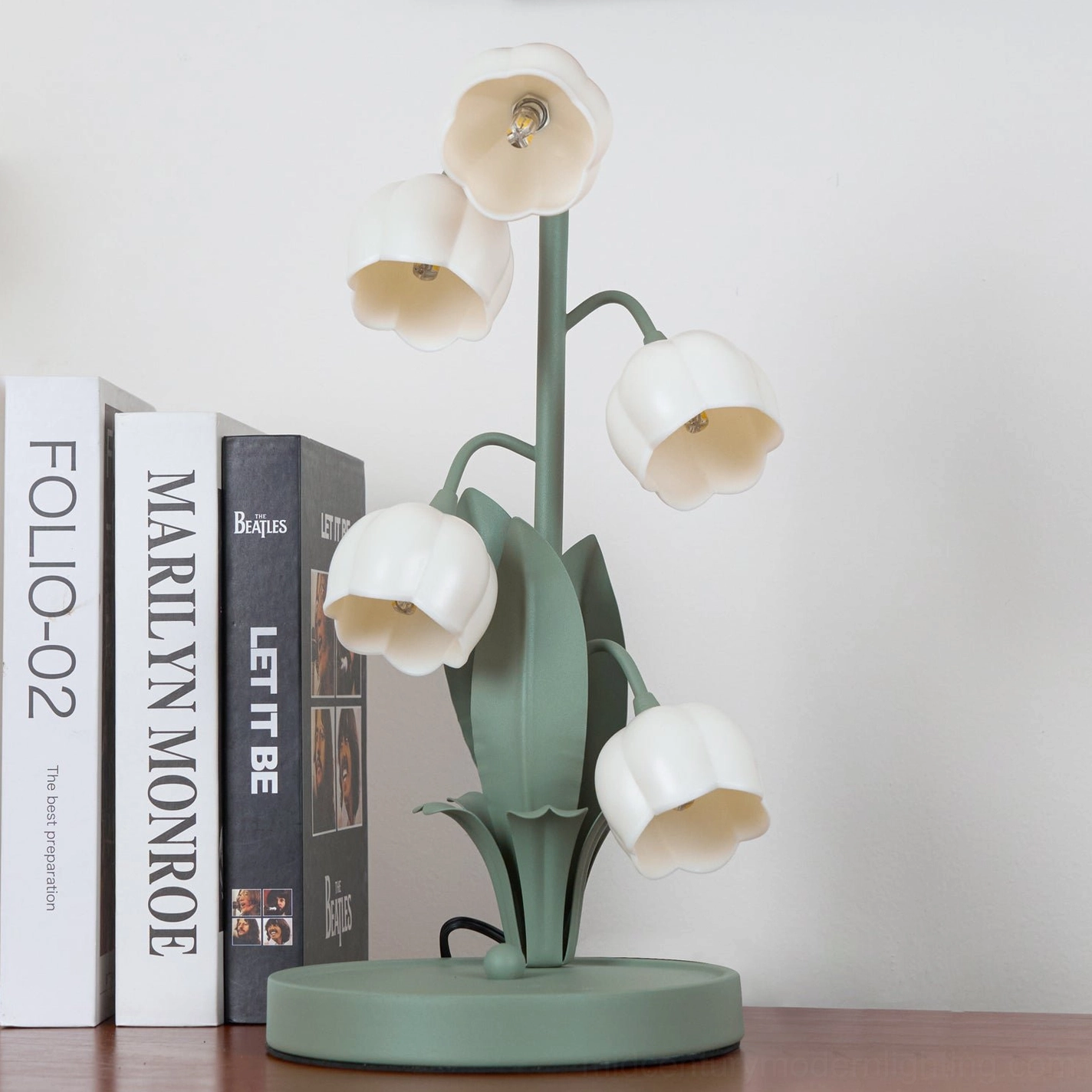 Bell Orchid Table Lamp in bedroom setting with soft natural lighting and minimal decor