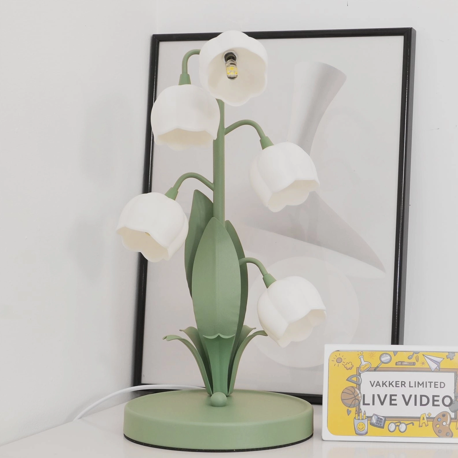 Bell Orchid Table Lamp on nightstand beside bed providing soft bedside reading light atmosphere