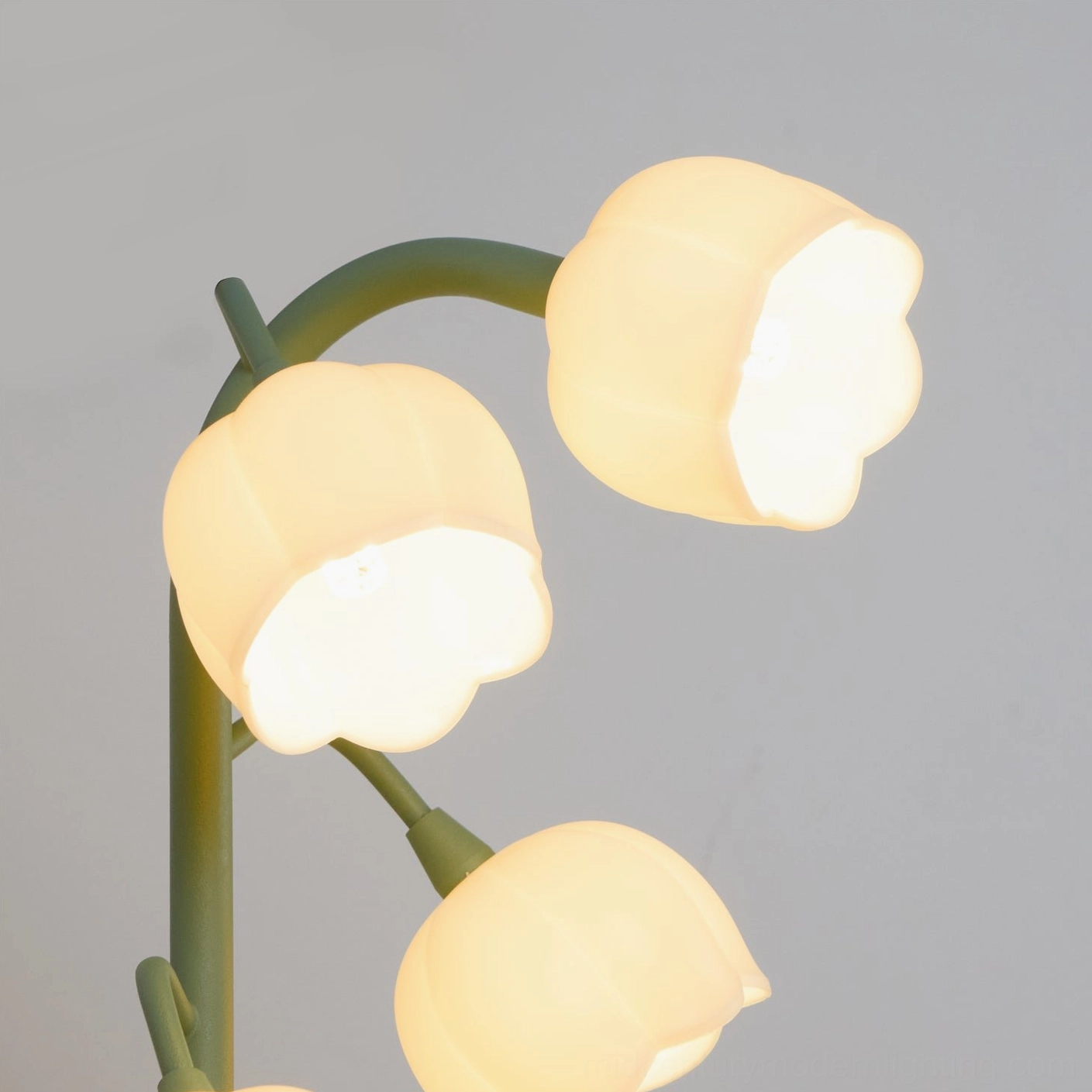 Bell Orchid Table Lamp side profile showing metal stem and polycarbonate shade construction