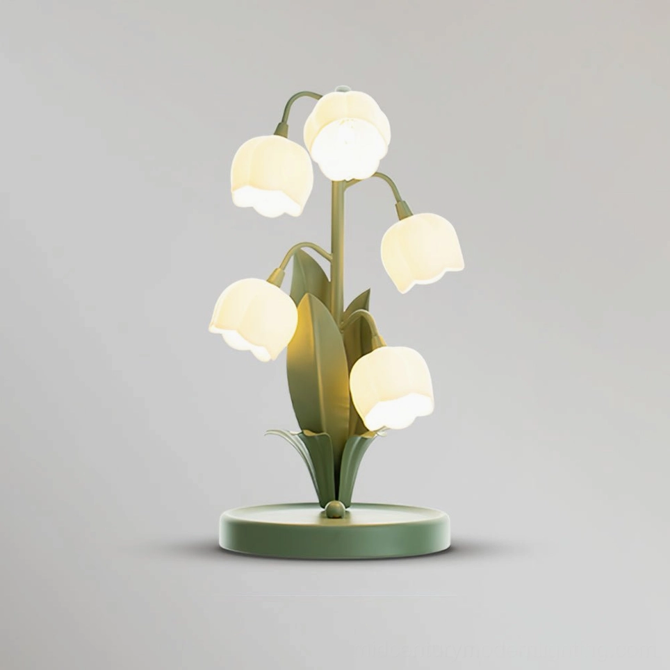 Bell Orchid Table Lamp in soft white finish providing ambient light in contemporary home setting
