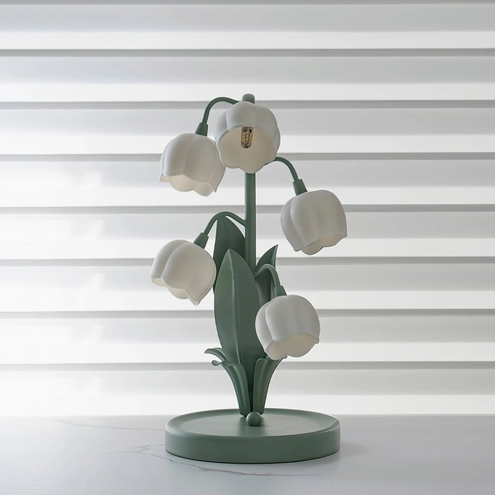 Bell Orchid Table Lamp unlit on white surface with window blinds, clean minimalist display