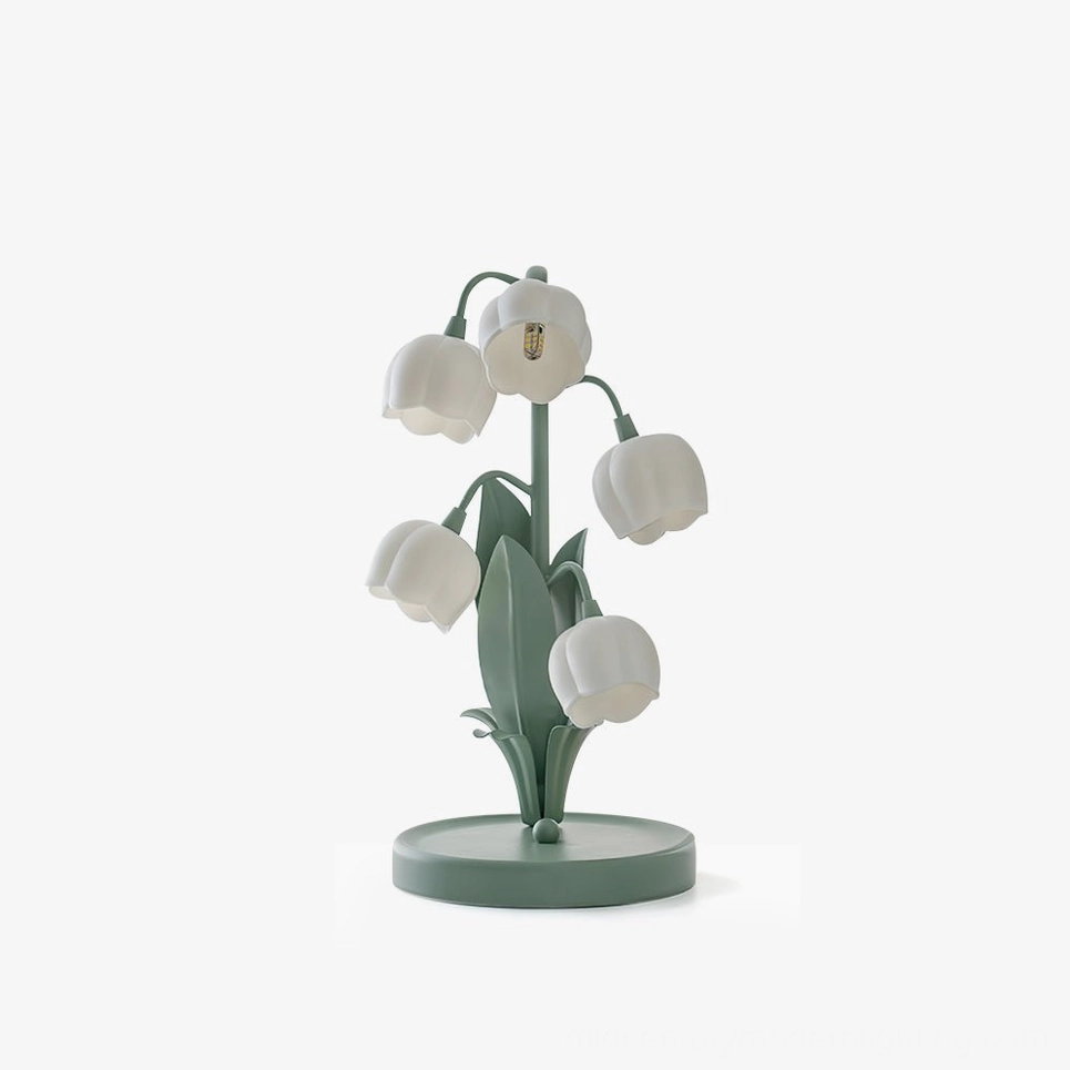 Bell Orchid Table Lamp with sage green metal base and white printed orchid pattern shade, studio front view