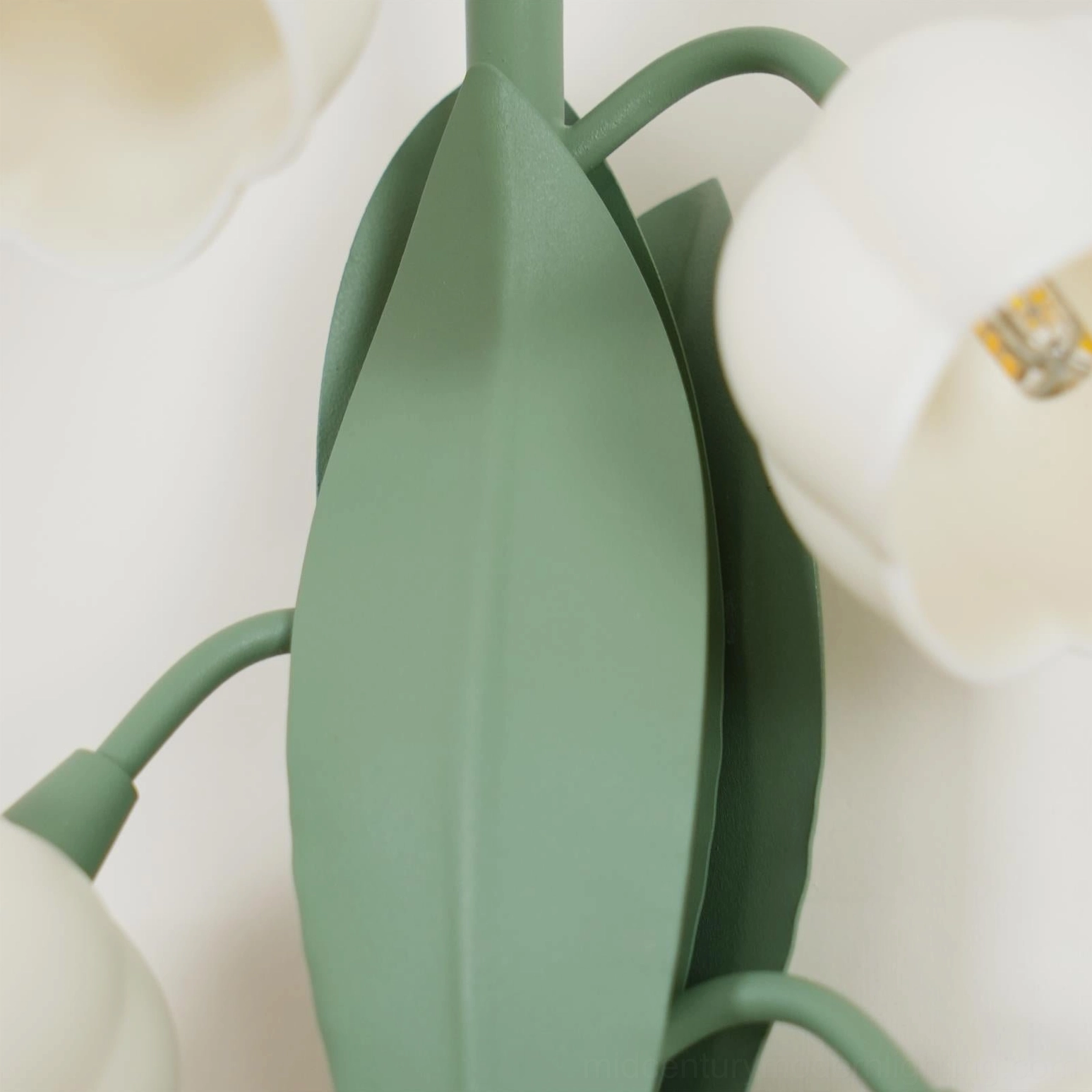 Bell Orchid Lily of the Valley wall lamp three flower buds detail green leaves metal stem artistic view