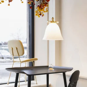 White bell pendant lamp installed above dining table nordic minimalist interior design