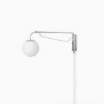 Bellman adjustable swing arm wall sconce, chrome finish, displayed in minimalist setting with white background