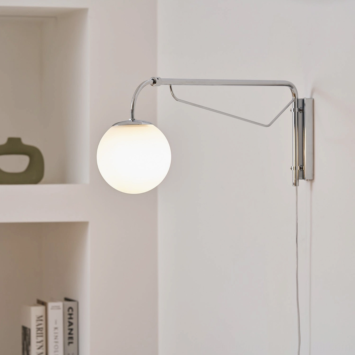 Chrome and white finish options for Bellman adjustable swing arm wall sconce