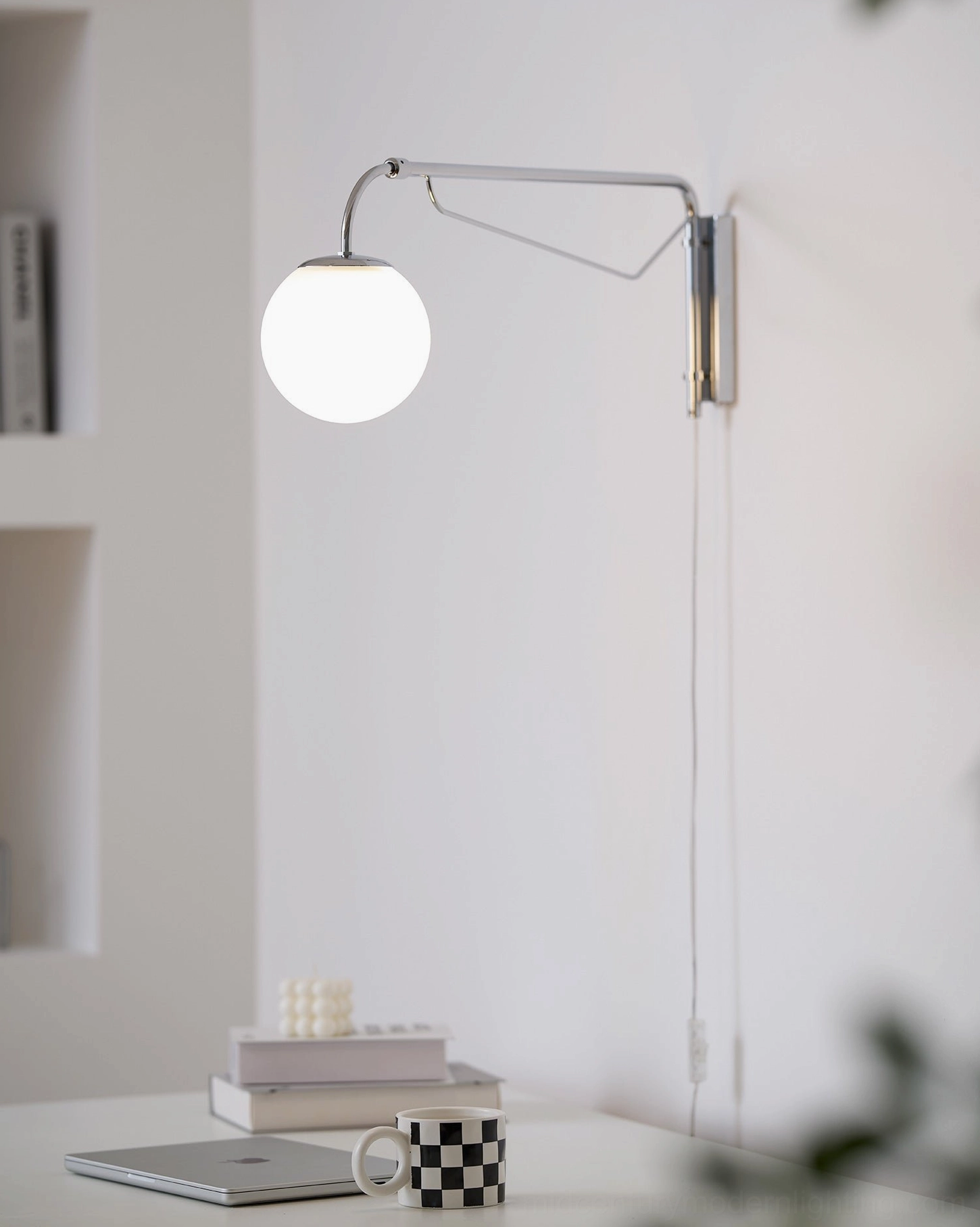 Adjustable swing arm wall sconce with LED bulb compatibility showcase