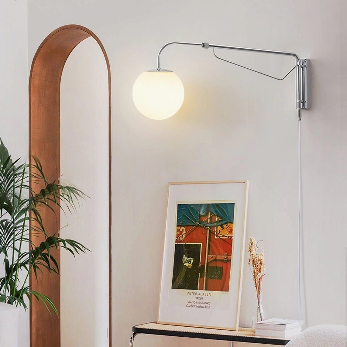 Adjustable sconce wall lamp in Nordic entryway with arched mirror and minimalist decor